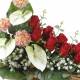Jardinera cementeri flors artificials capolls roses